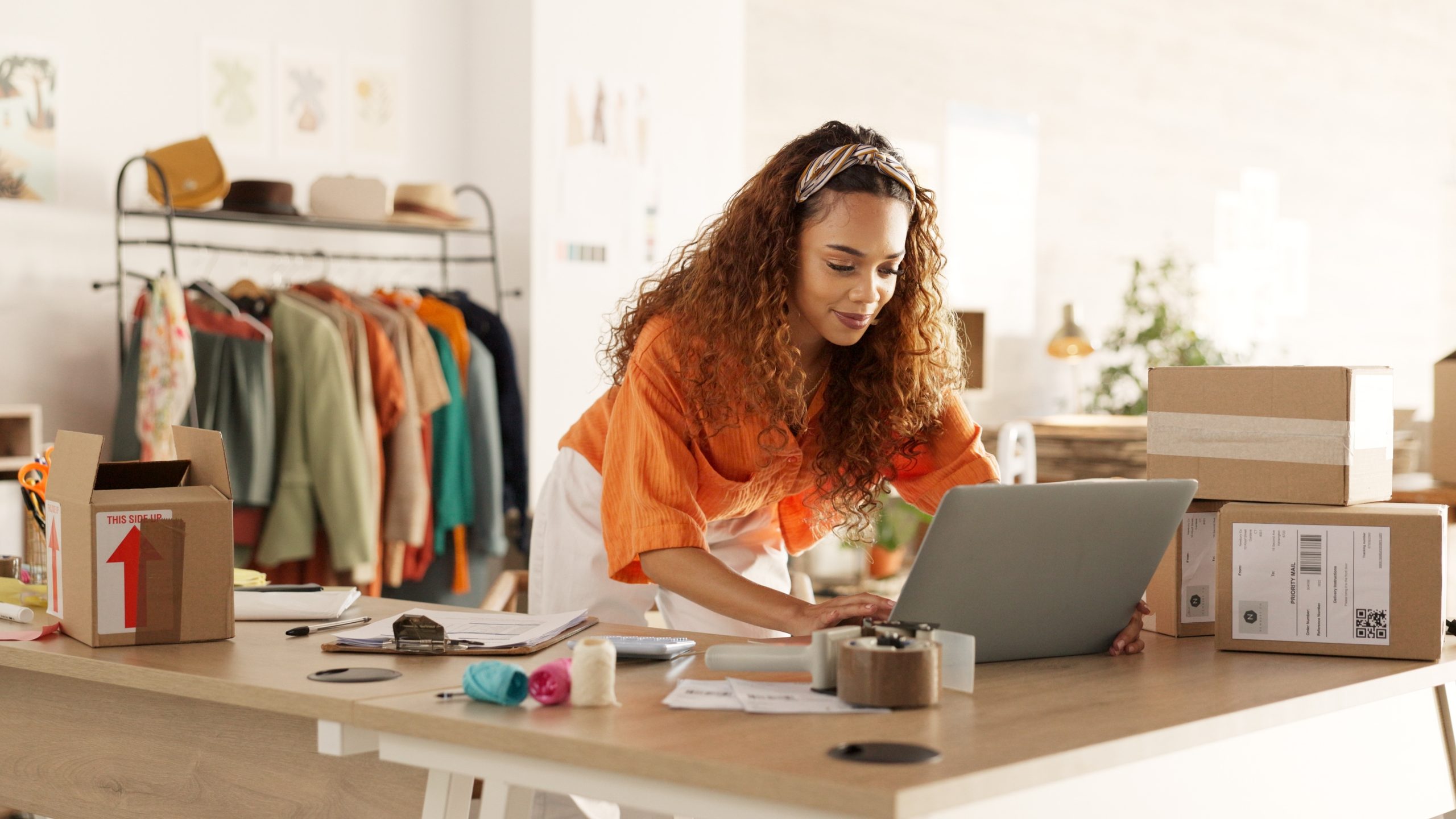 Logistics,,Laptop,And,Fashion,Manager,Of,Retail,Or,Boutique,Shop