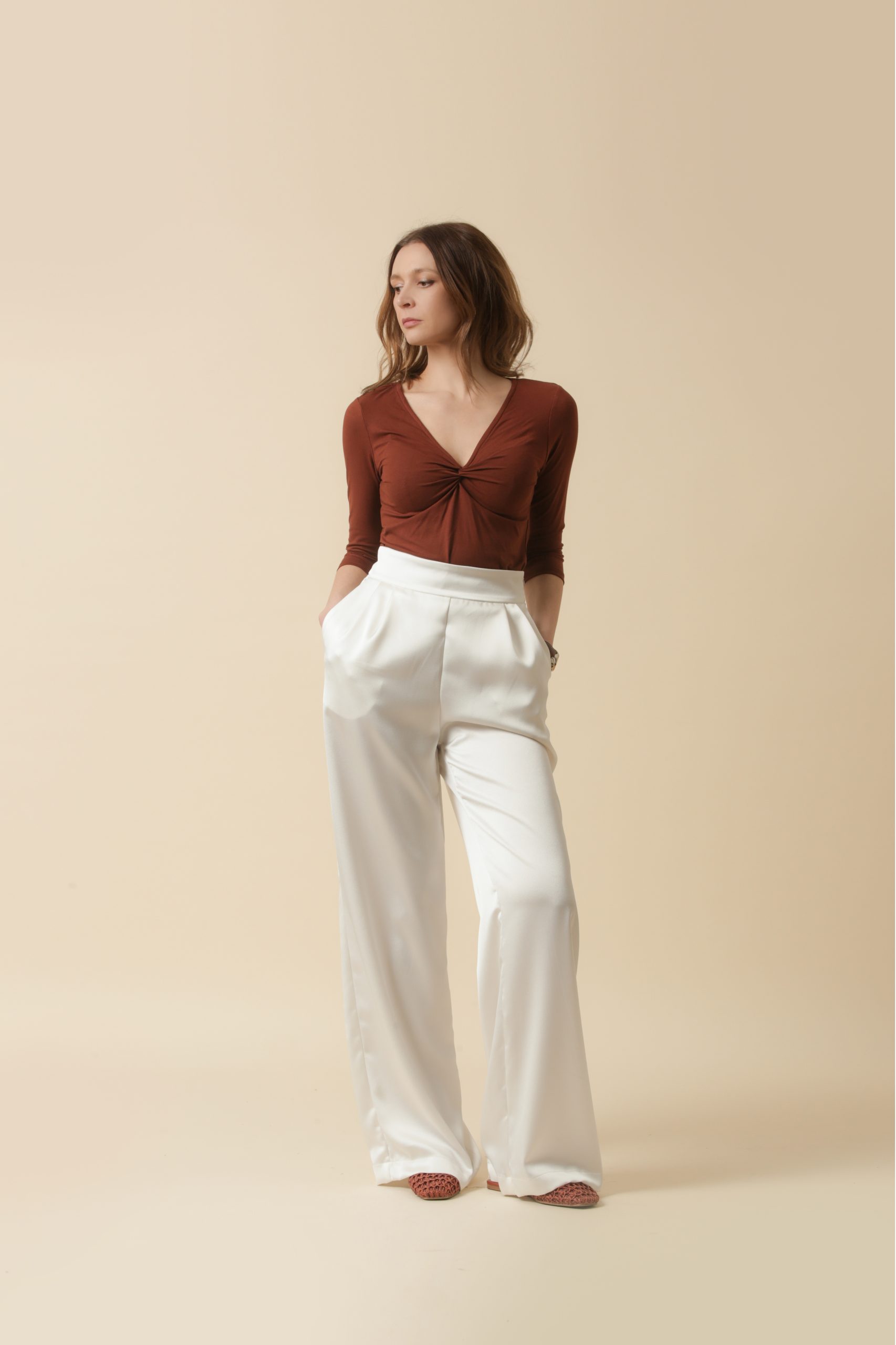 Female,Model,Wearing,Brown,Cotton,Top,And,White,Trousers.,Classic